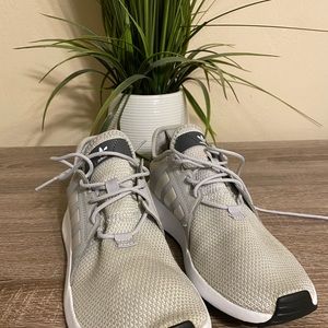 Used gray adidas shoes